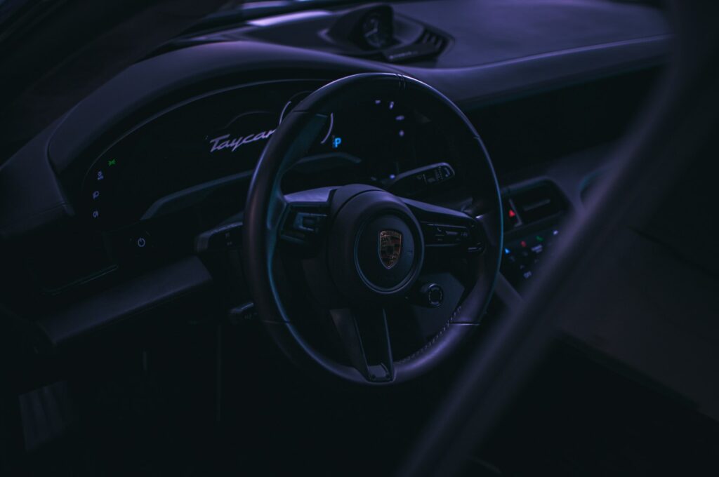 Steering wheel and dashboard of a car, where a steering warning light would appear